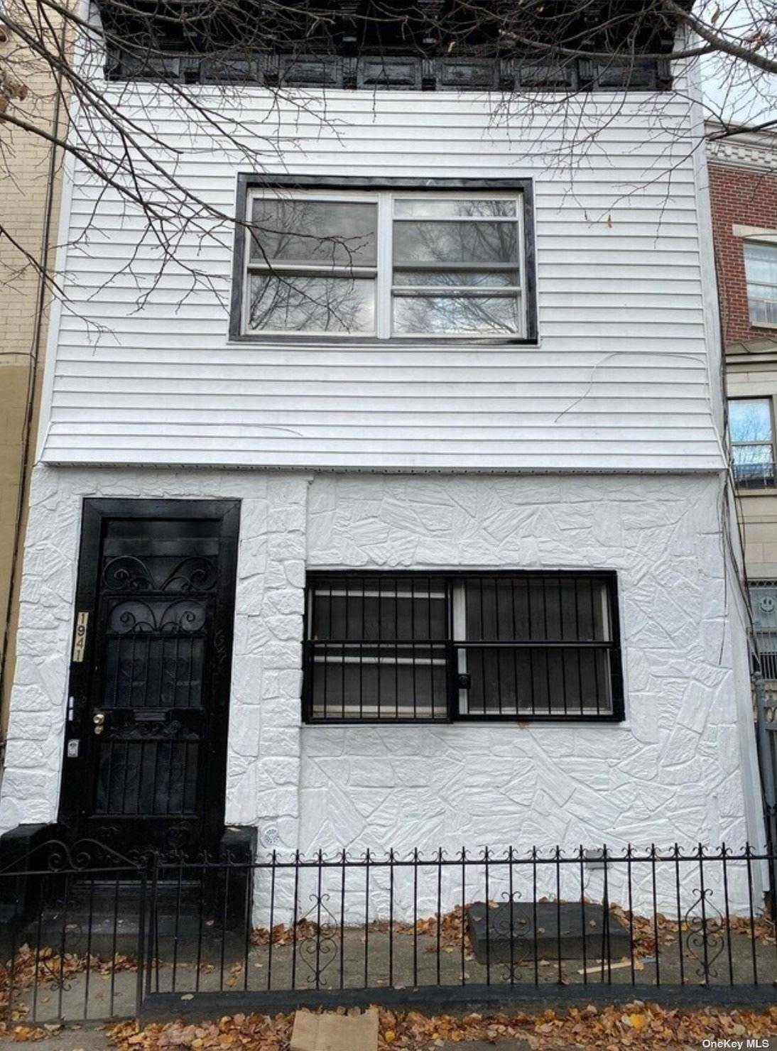 This recently renovated two family house in Brooklyn, New York, presents an excellent investment opportunity.