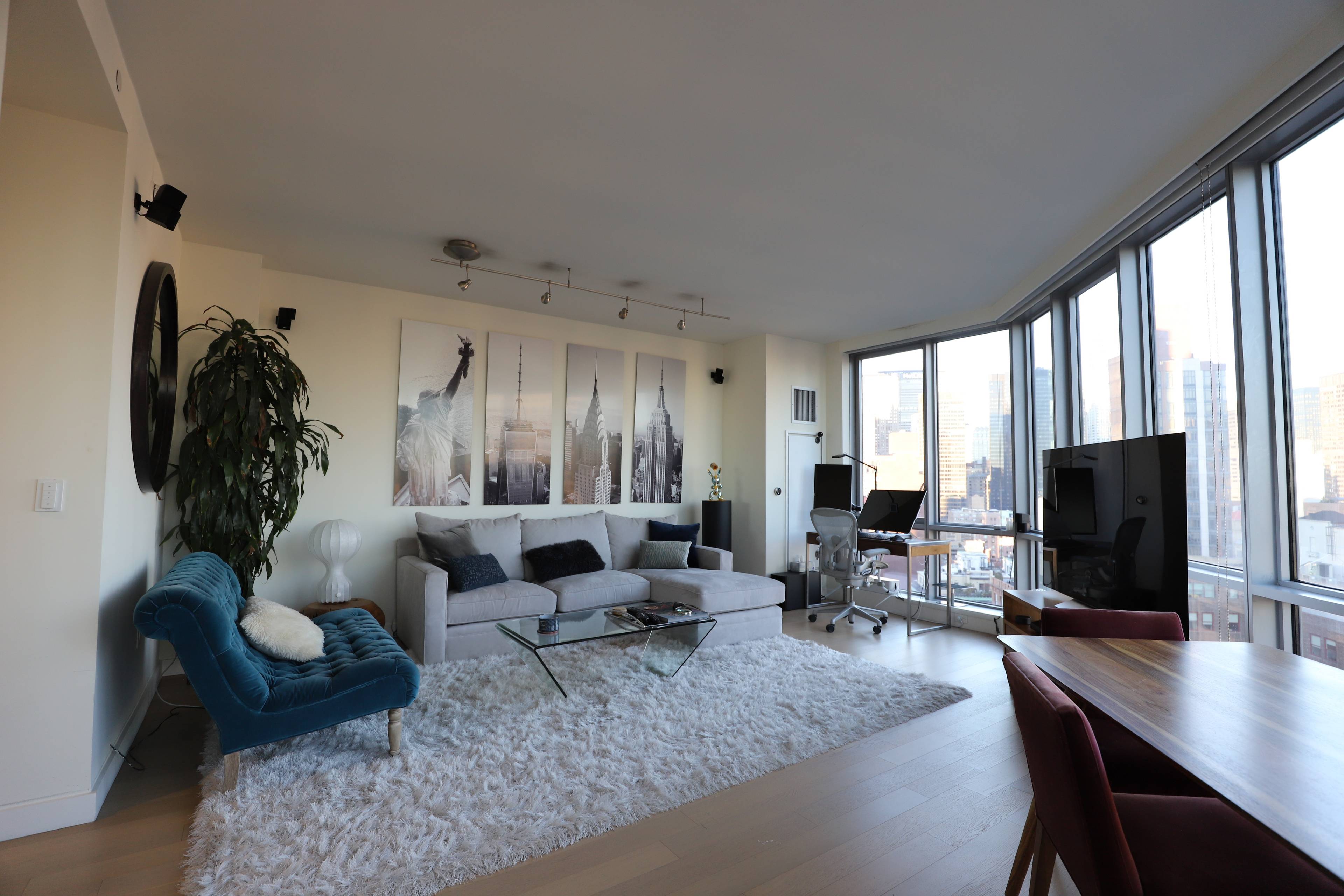 Sun drenched stunning over sized corner 1 bedroom home featuring 12 floor to ceiling windows from your living room with a triple northern eastern southern exposure !
