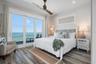Bedroom 2 on the upper level with a balcony and views of Tampa Bay
