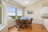 Breakfast Room with bay window overlooking the water