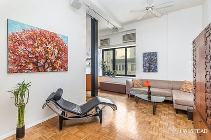 This spacious home encompasses everything you would want in a quintessential Manhattan loft.