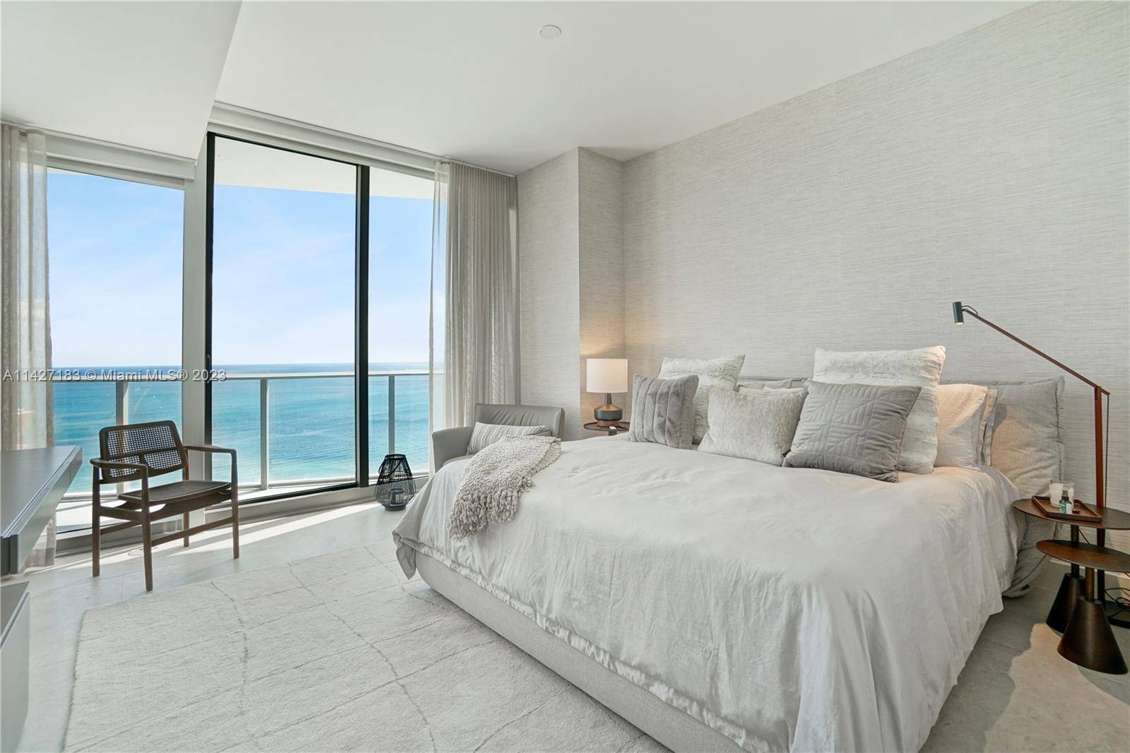 Over 450k in upgrades in this exquisite 2 2 1 beachfront condo in one and only Ritz Residences.