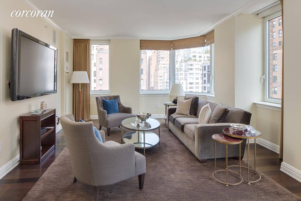Located in a premier condominium on the Upper Eastside, this high floor sun filled five bedroom residence is perfectly suited for sophisticated living and grand entertaining.