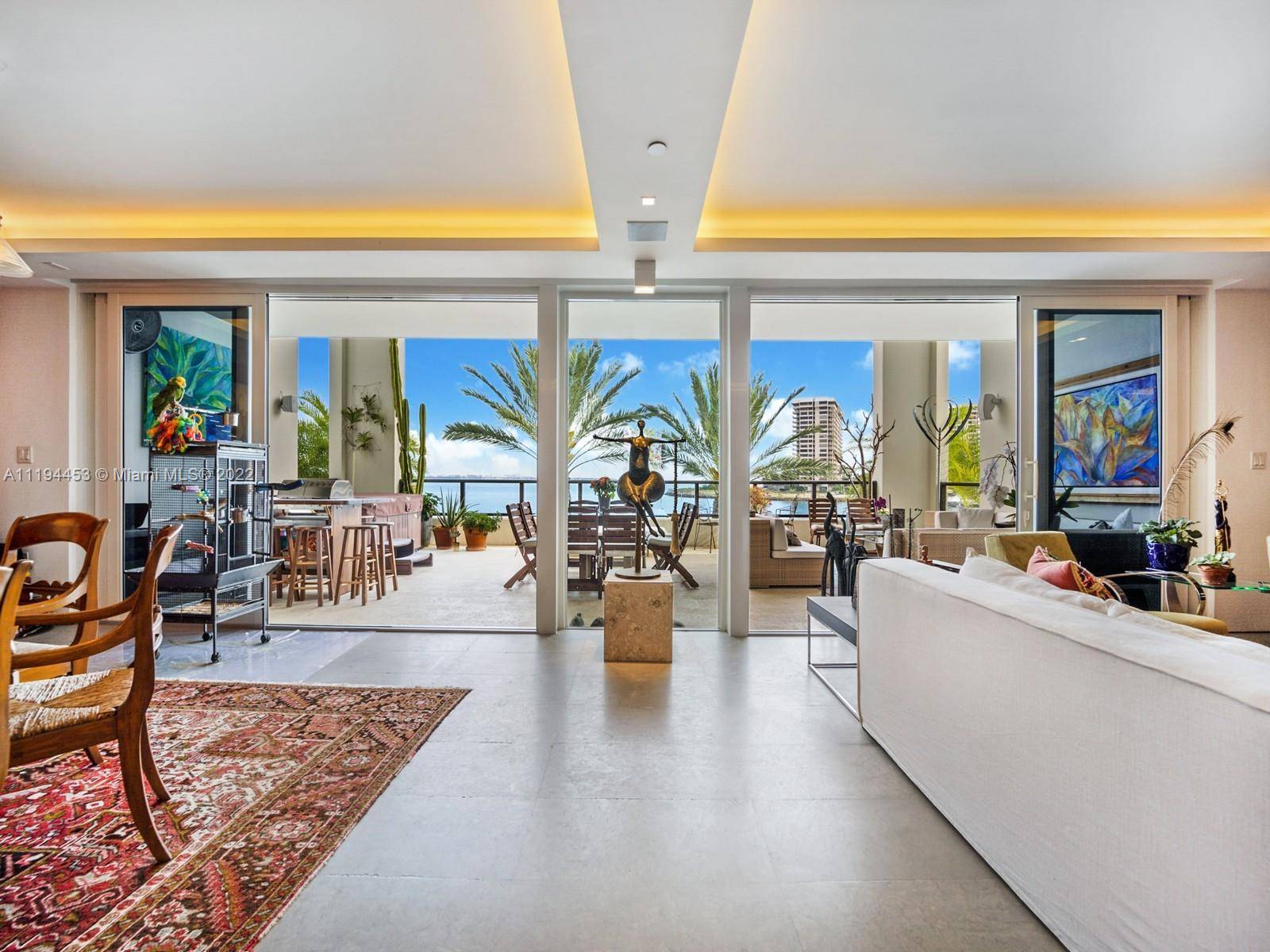 Sophisticatedly tropical along Biscayne Bay is this 2 STORY 3 bed, 4 ½ bath residence located in the exclusive Residences of Vizcaya in Coconut Grove.