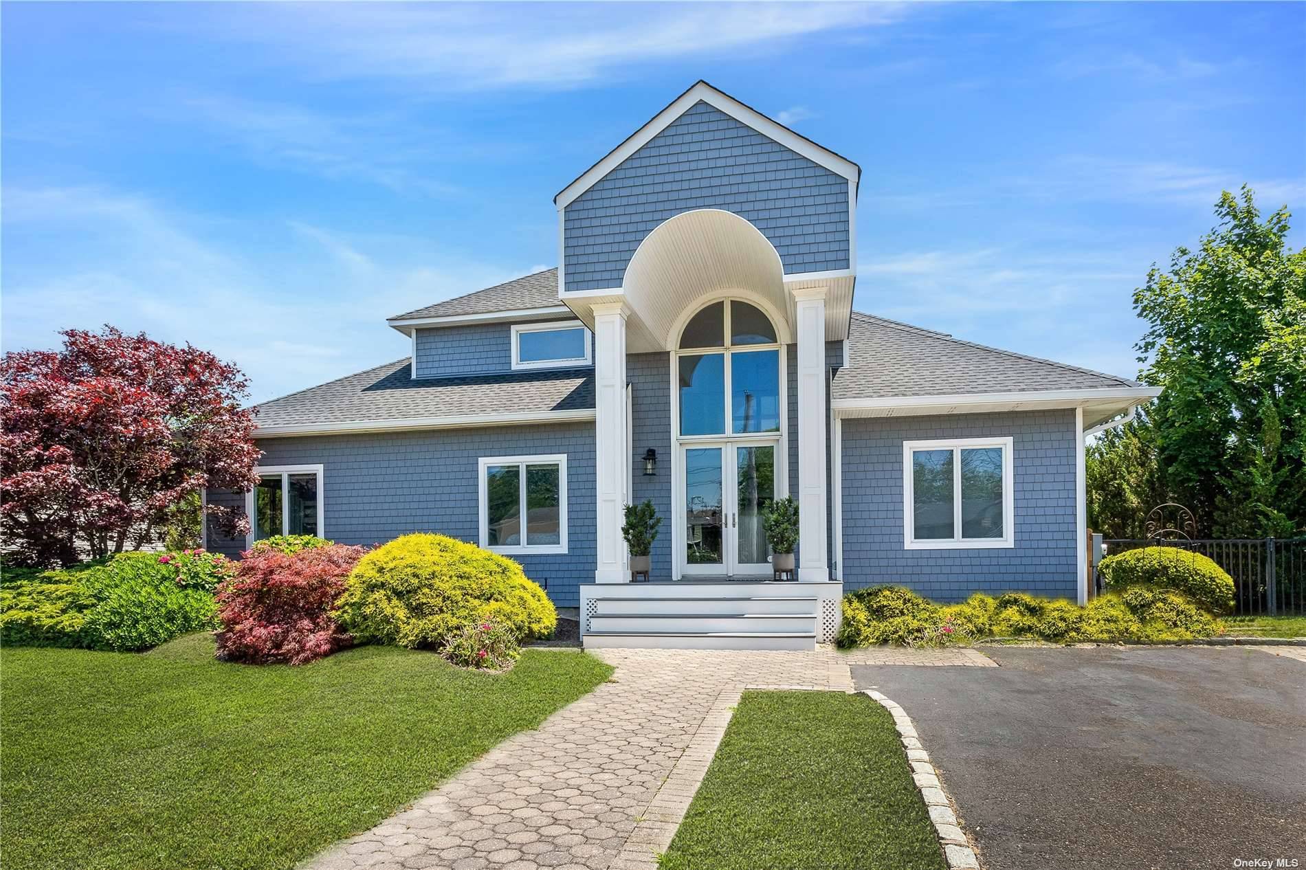Located in the highly desirable Shinnecock Shores Community, this totally renovated post modern home has everything you could possibly want, including a private sandy beach.