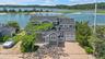 View of subject property featuring a large body of water