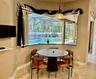 Kitchen Dinette Area w/TV Furniture Overlooking Pool/Spa