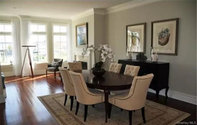 Spacious formal dining area between living room & kitchen... spectacular open concept floor plan... designed for easy living & entertaining...