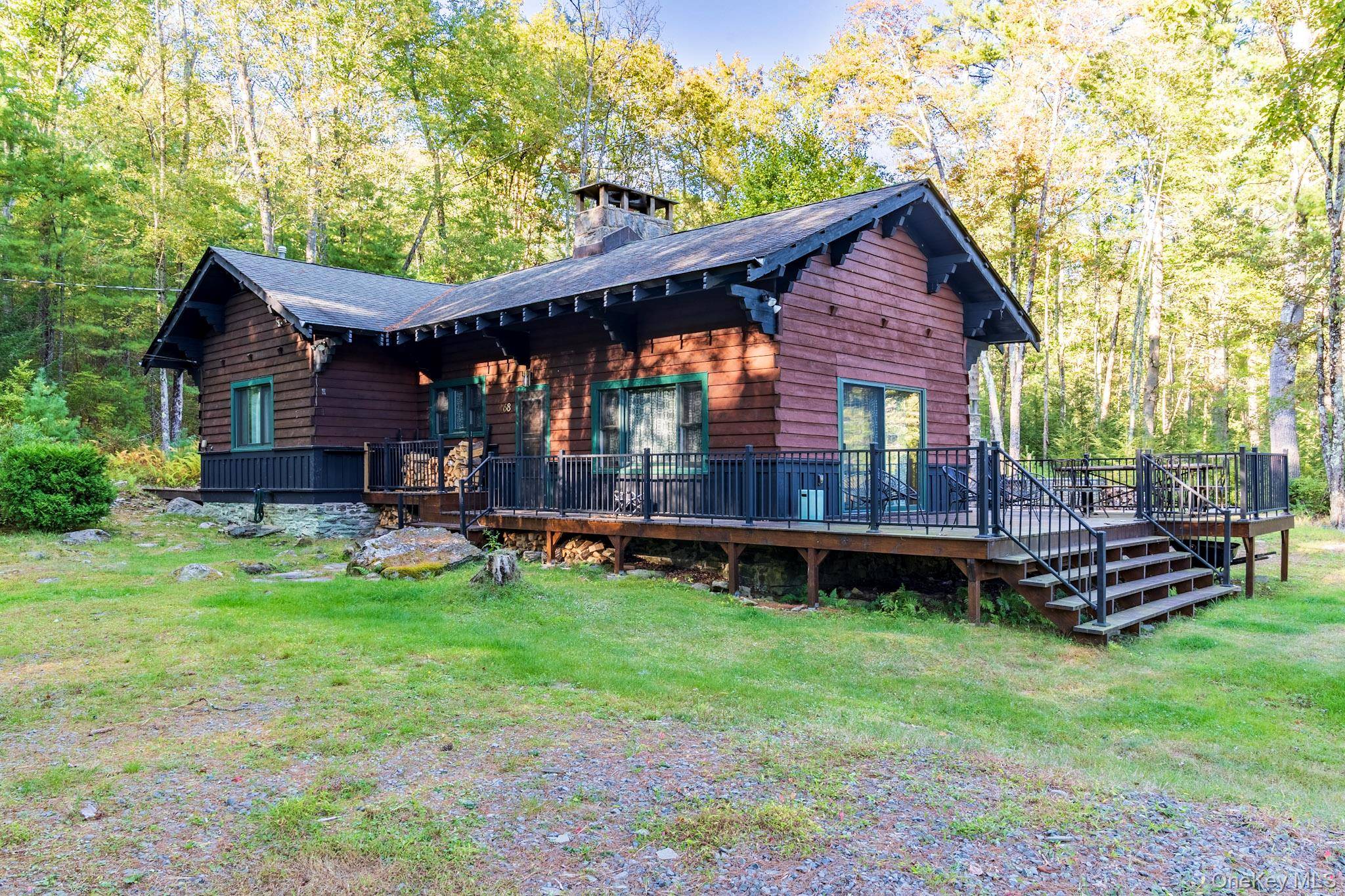 Your dream lakefront retreat awaits at the very end of a private road in beautiful Forestburgh, NY.