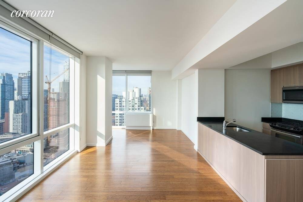Behold this exquisite 2 bedroom, 2 bathroom apartment perfectly located in Fort Greene with unobstructed views of the city skyline and the statue of liberty !