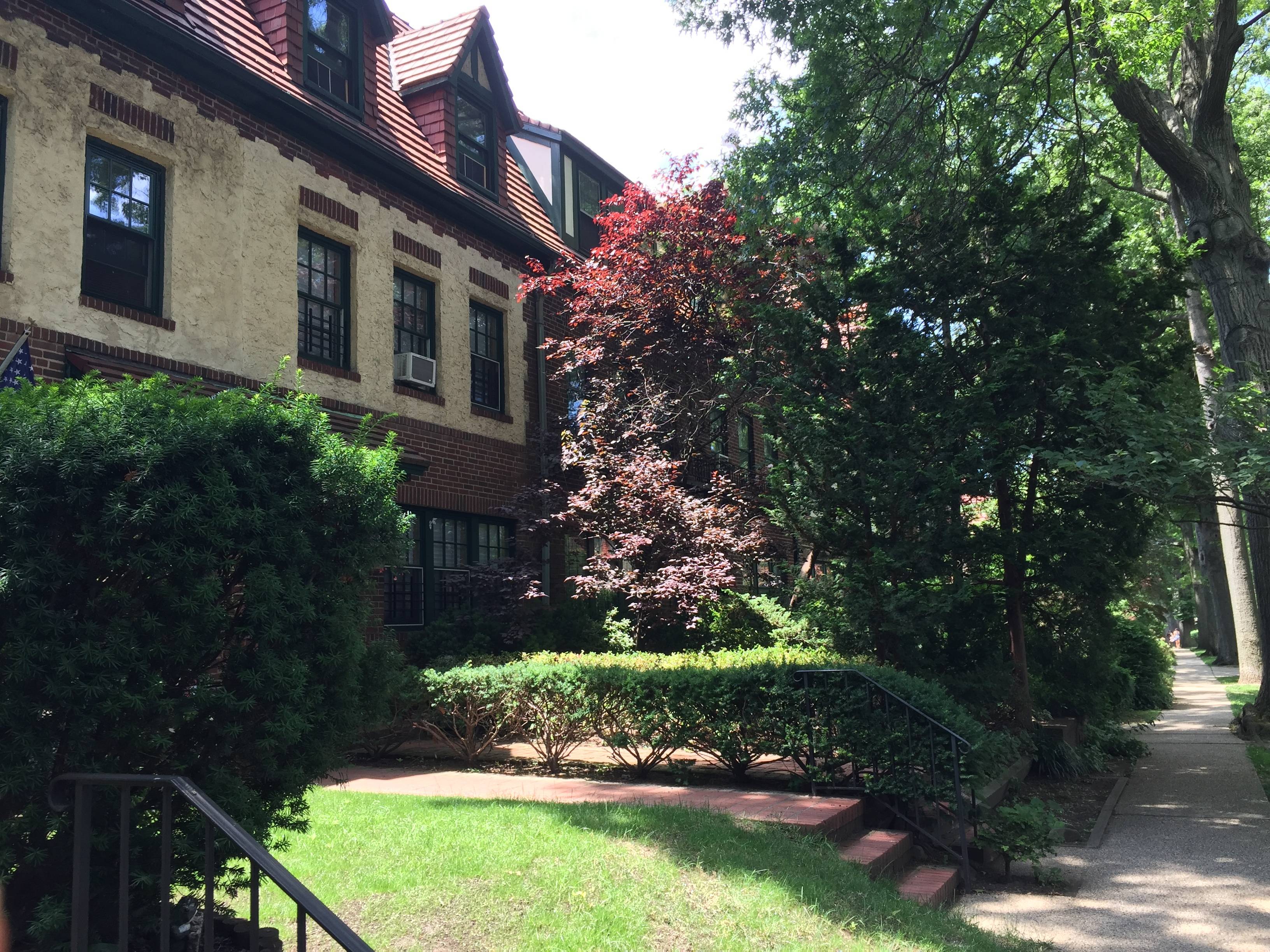 Renovated large duplex unit plus basement in a Tudor townhouse in the historic Forest Hills Gardens, private community.