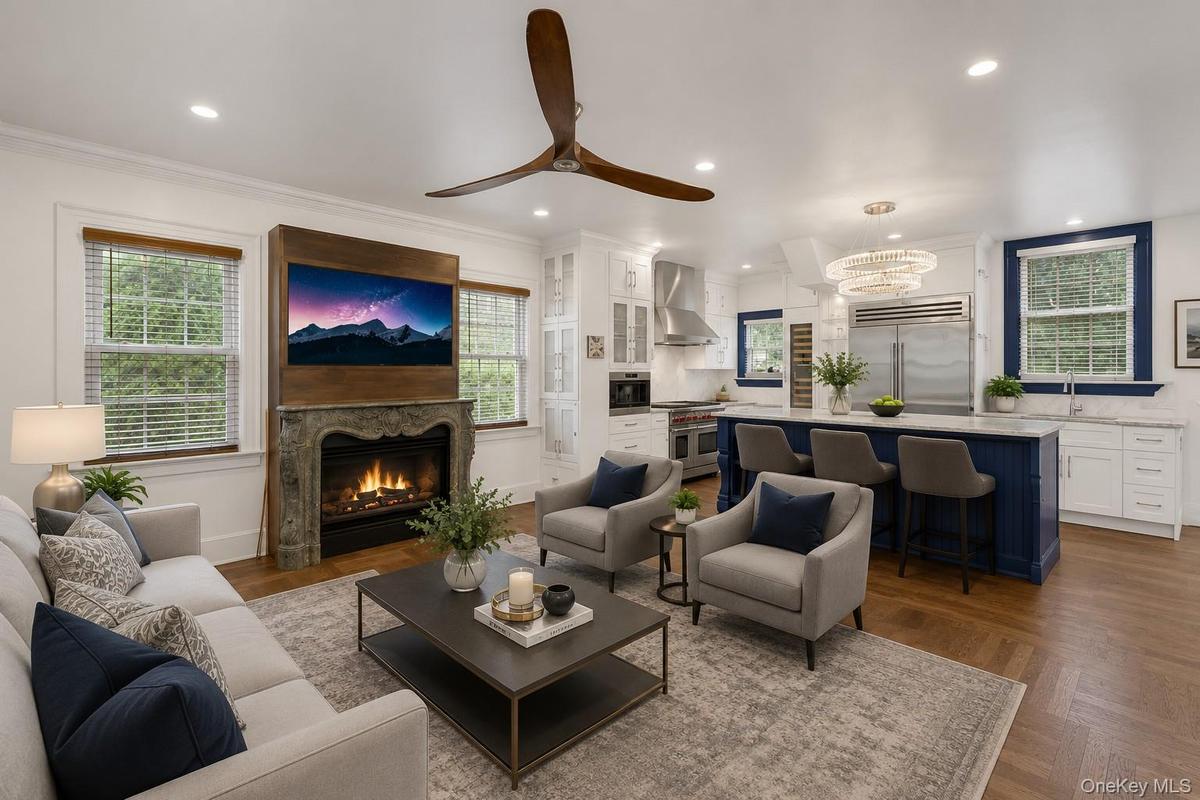 Virtual picture of the living room with a fireplace making the living room cozy
