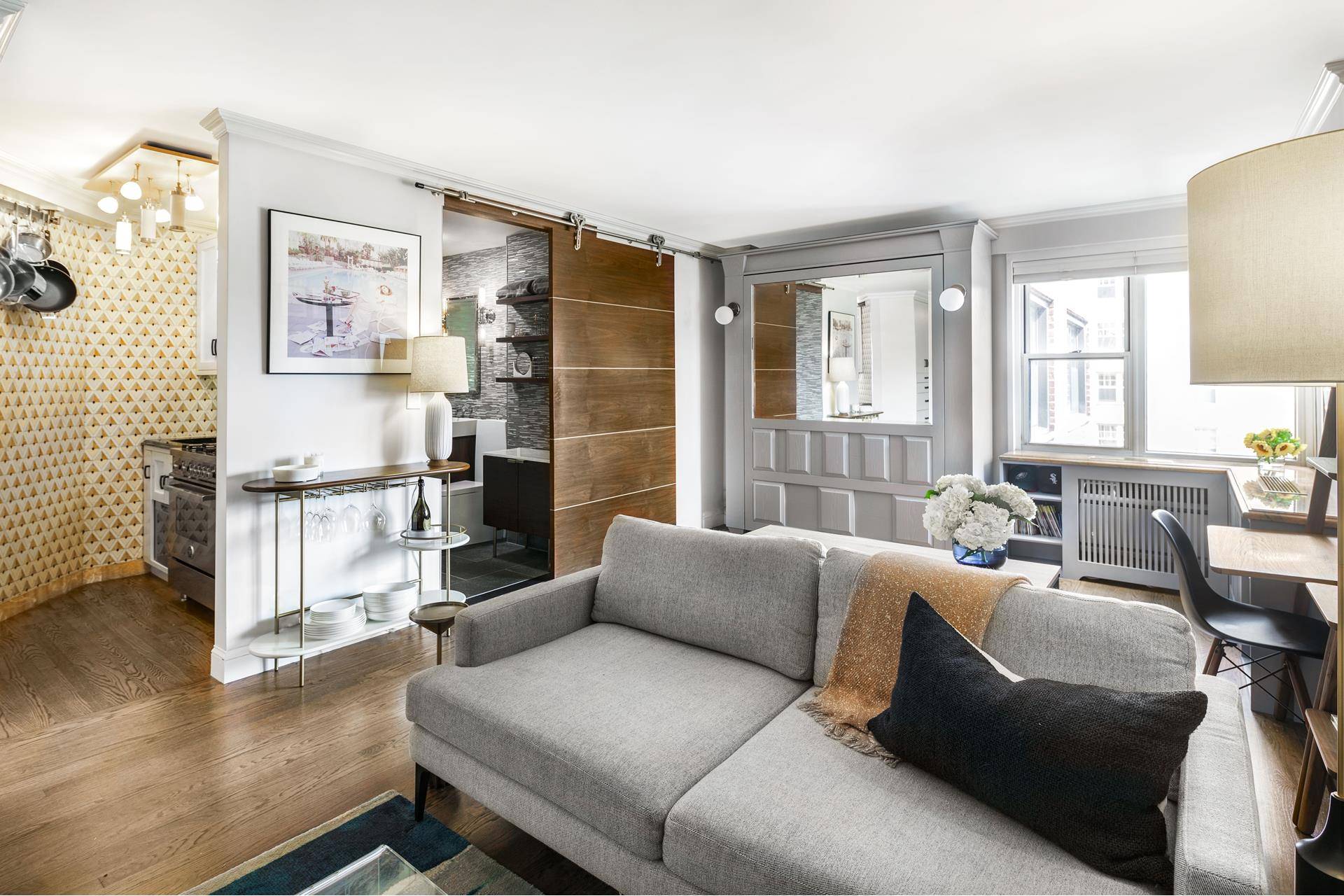 Experience West Village living at its finest in this spacious, smartly renovated corner studio apartment with unobstructed views.