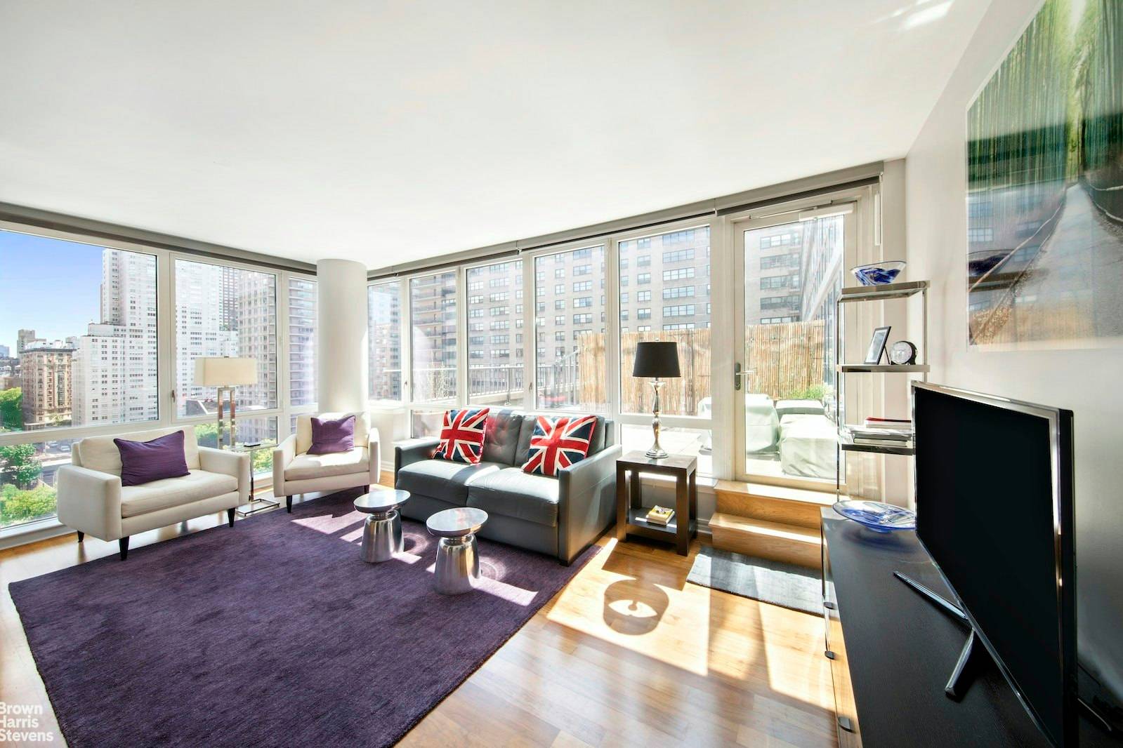 Situated high on the 15th floor in one of the most desirable buildings on the Upper West Side, this unique corner 1 bedroom, 1.
