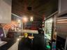 Kitchen featuring pendant lighting and a kitchen breakfast bar