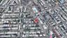 Aerial view of property and surrounding area with nearby urban area