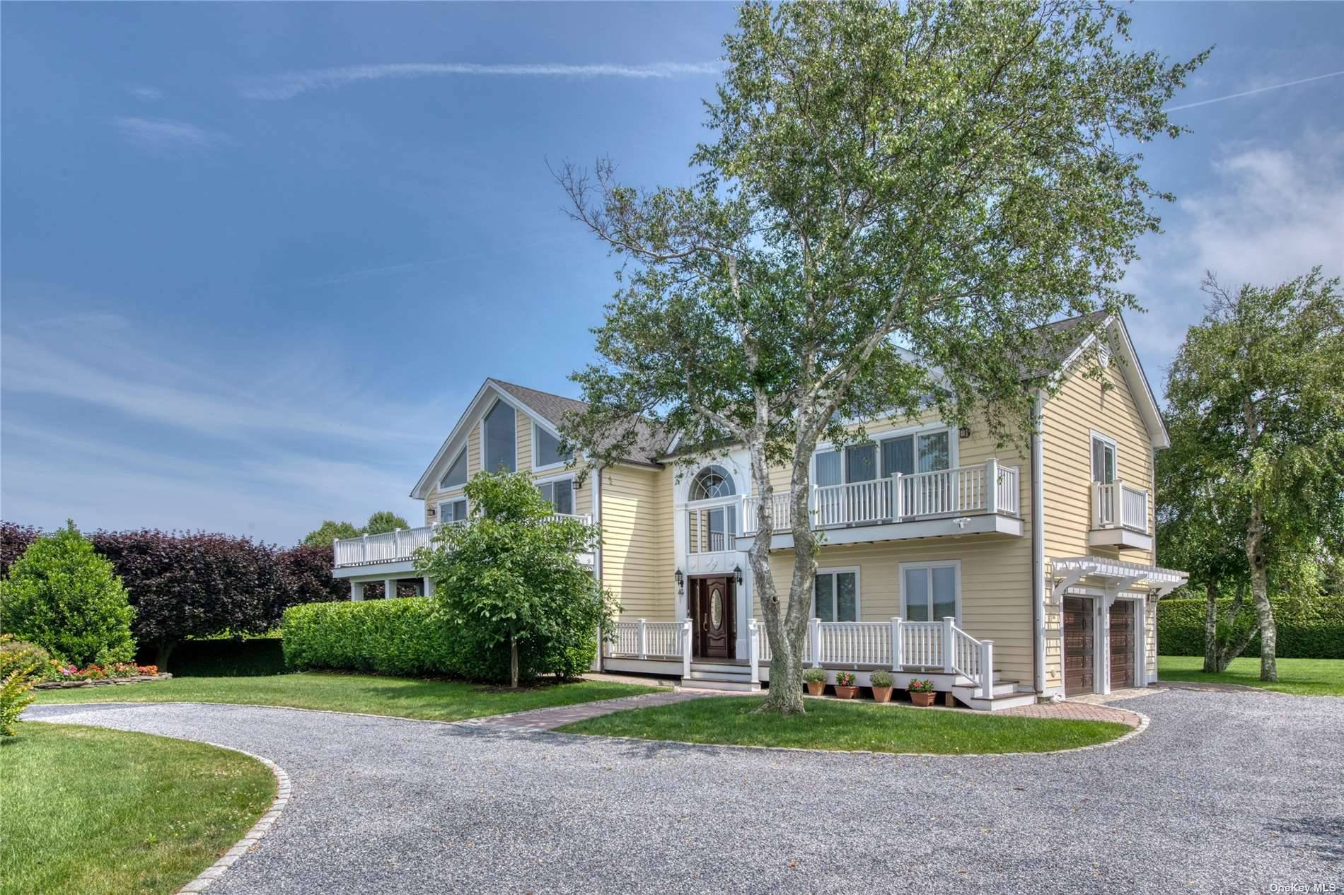 This bright and airy Orient estate, nestled in a quiet secluded neighborhood, offers extensive breath taking water views of the Long Island Sound.