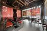 Dining room featuring a towering ceiling