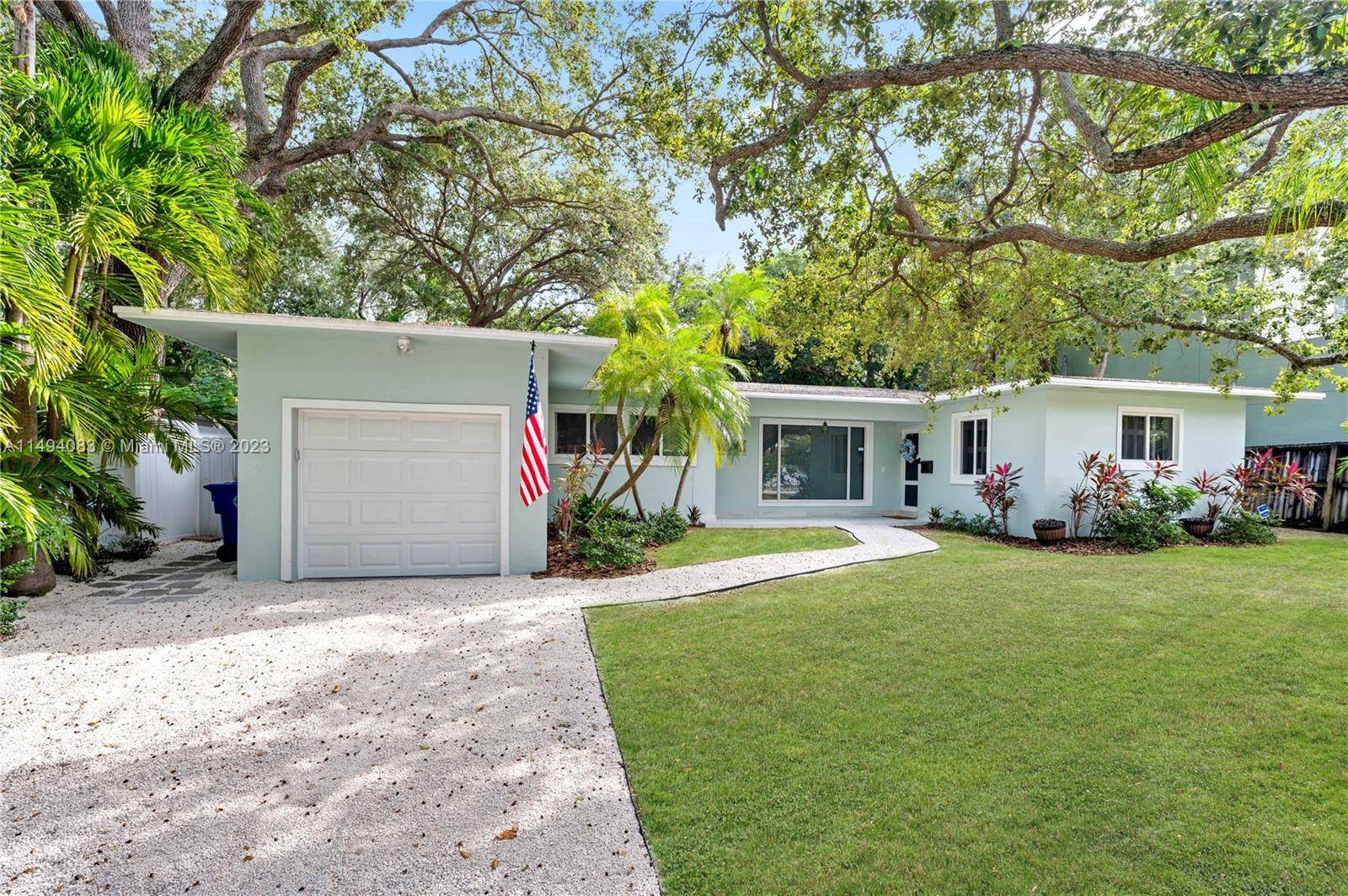 Nestled in the iconic Coconut Grove, this fully remodeled home offers 3 bedrooms, a versatile den or office, and two bathrooms.