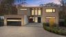 Contemporary home featuring gravel driveway and an attached garage