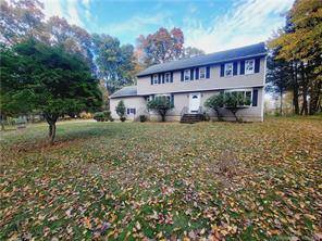 GREAT OPPORTUNITY ! ! This 4 bedroom colonial is sited on a lovely 1.