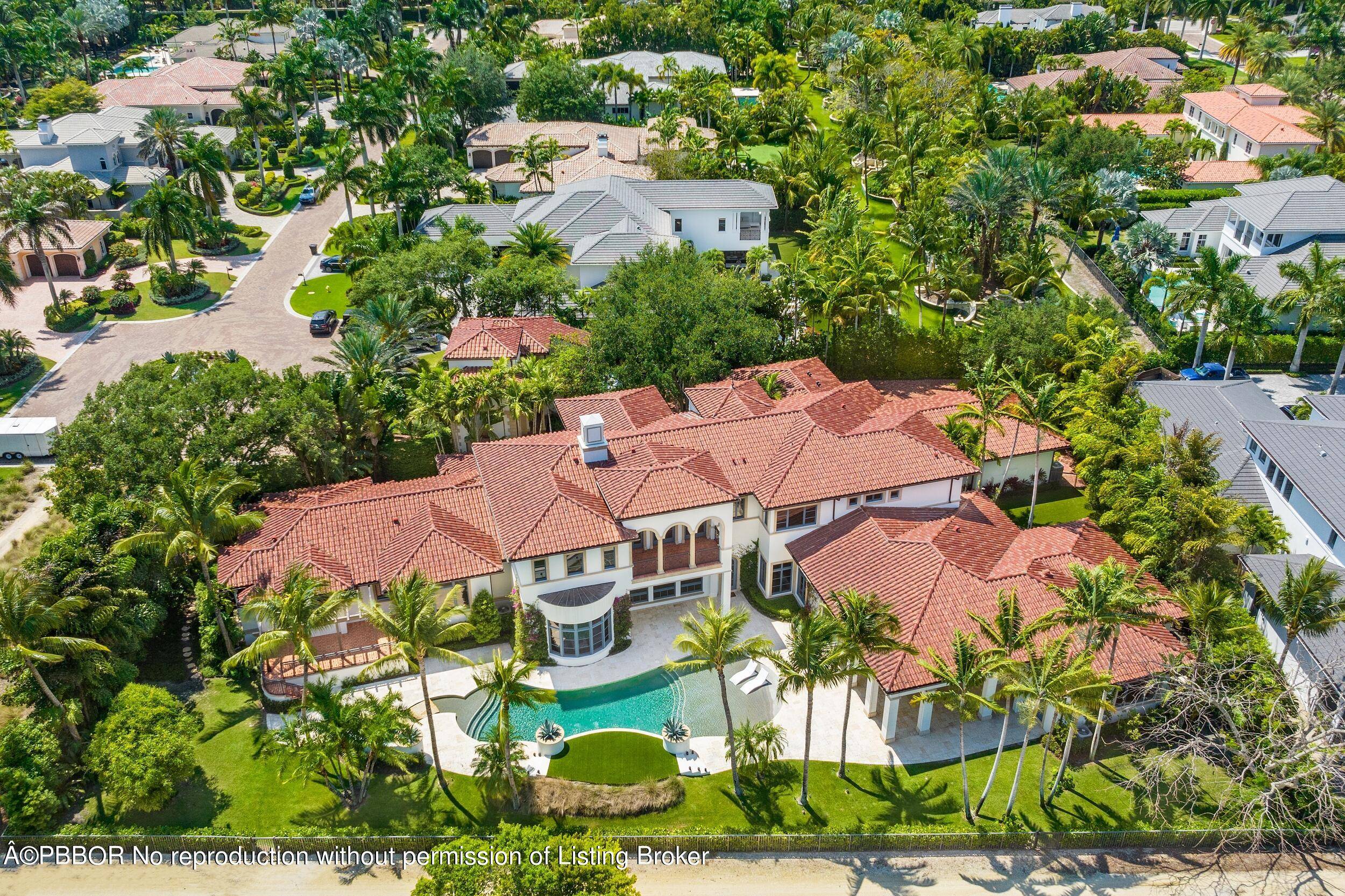 Nestled within the sought after Old Palm Golf Club, 11759 Elina Court sits on a prime 0.