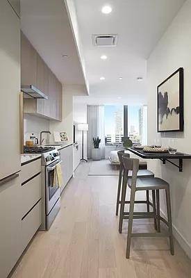 Enjoy breathtaking Manhattan views in this stunning studio apartment at luxurious Skyline Tower.