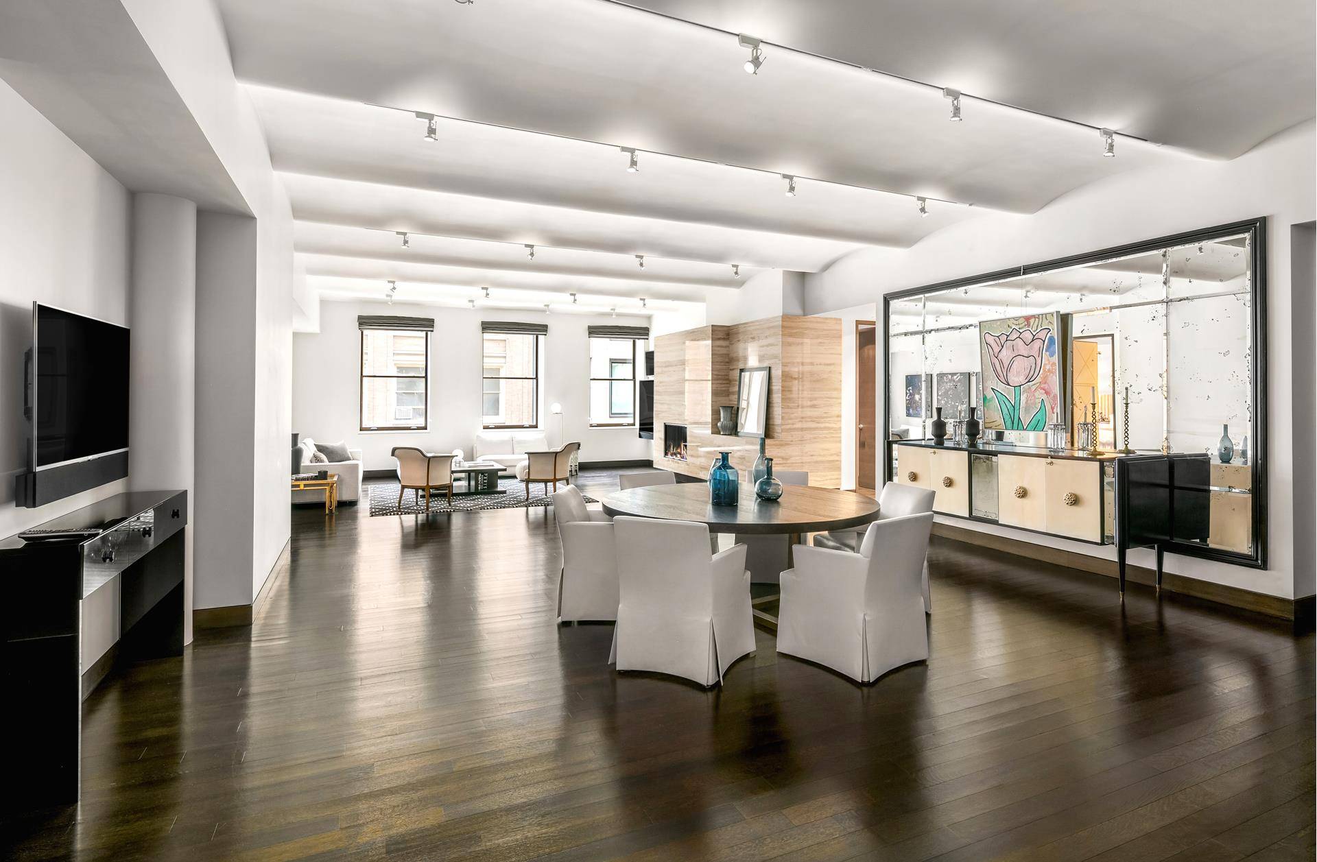 Stunning, sprawling Soho loft located within a boutique full service prewar condo building !