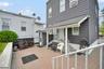 BACKYARD TO BASEMENT ENTRANCE