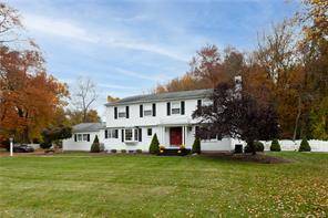 Elegance and stunning curb appeal will pull you into this well maintained colonial home, tucked away in a level, walkable neighborhood.