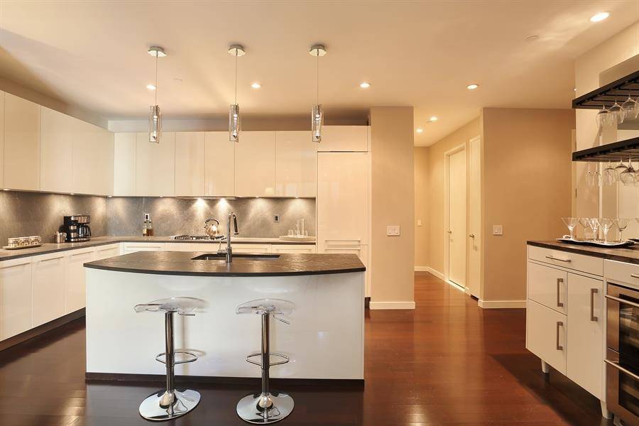 This exquisite two bedroom, three bath loft at 4 West 21st Street mixes refined city living with true modern comfort.