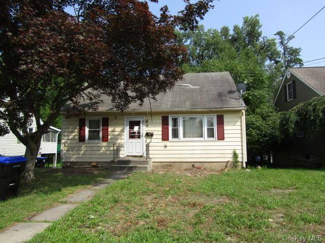 Located on a charming, tree lined street in the City of Poughkeepsie, this 4 bedroom, 1 bathroom Cape is in need of a top to bottom rehab.