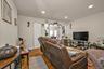 Living area featuring wood finished floors and recessed lighting