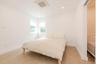 Bedroom with light colored carpet and recessed lighting