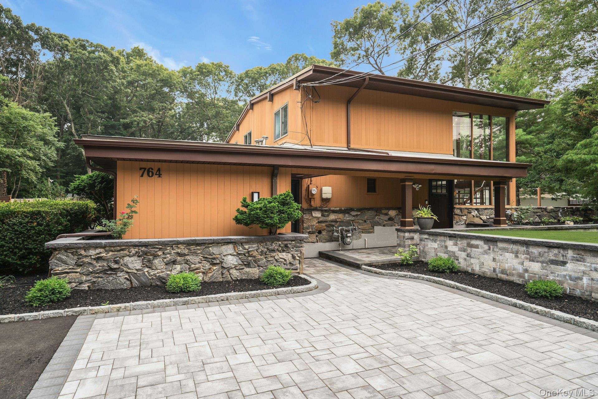 Welcome to 764 Vanderbilt Pkwy in Dix Hills,