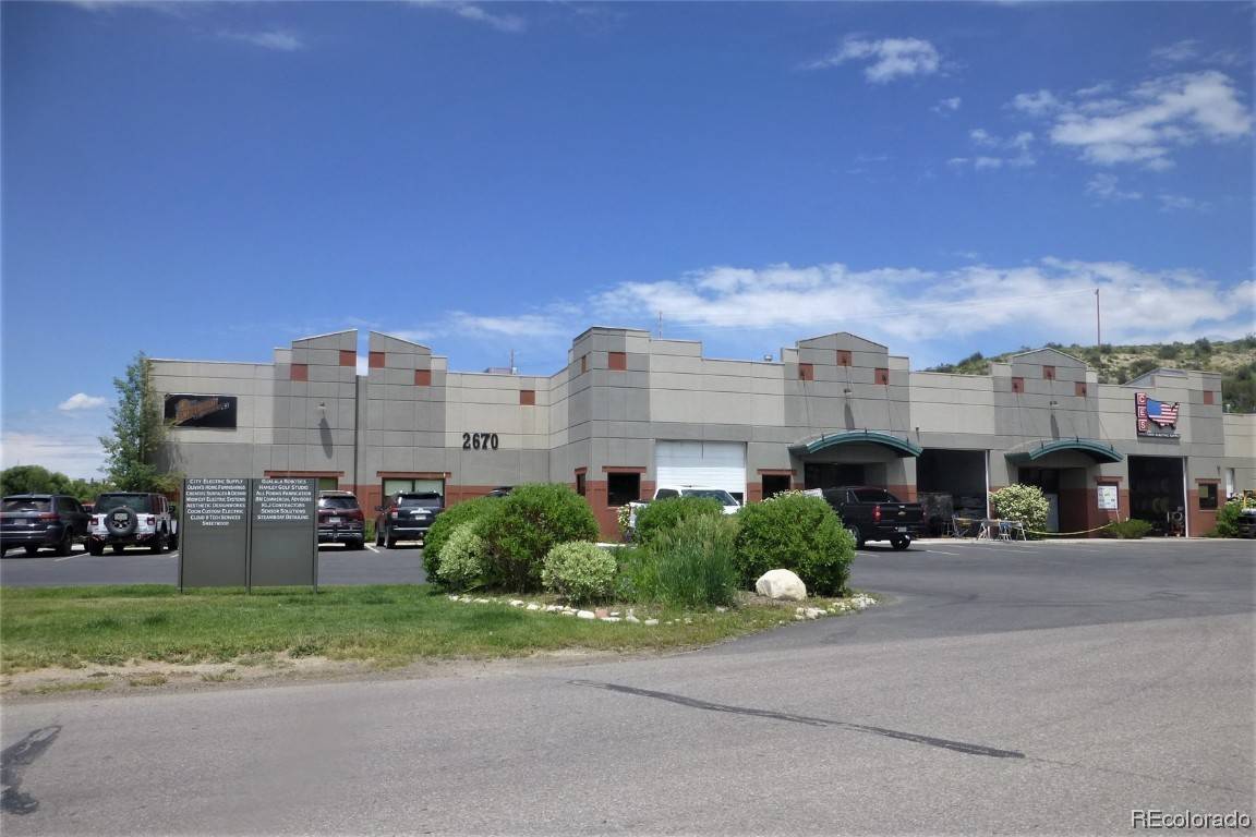Hard to find large 2, 939 square feet commercial condominium with Industrial zoning.