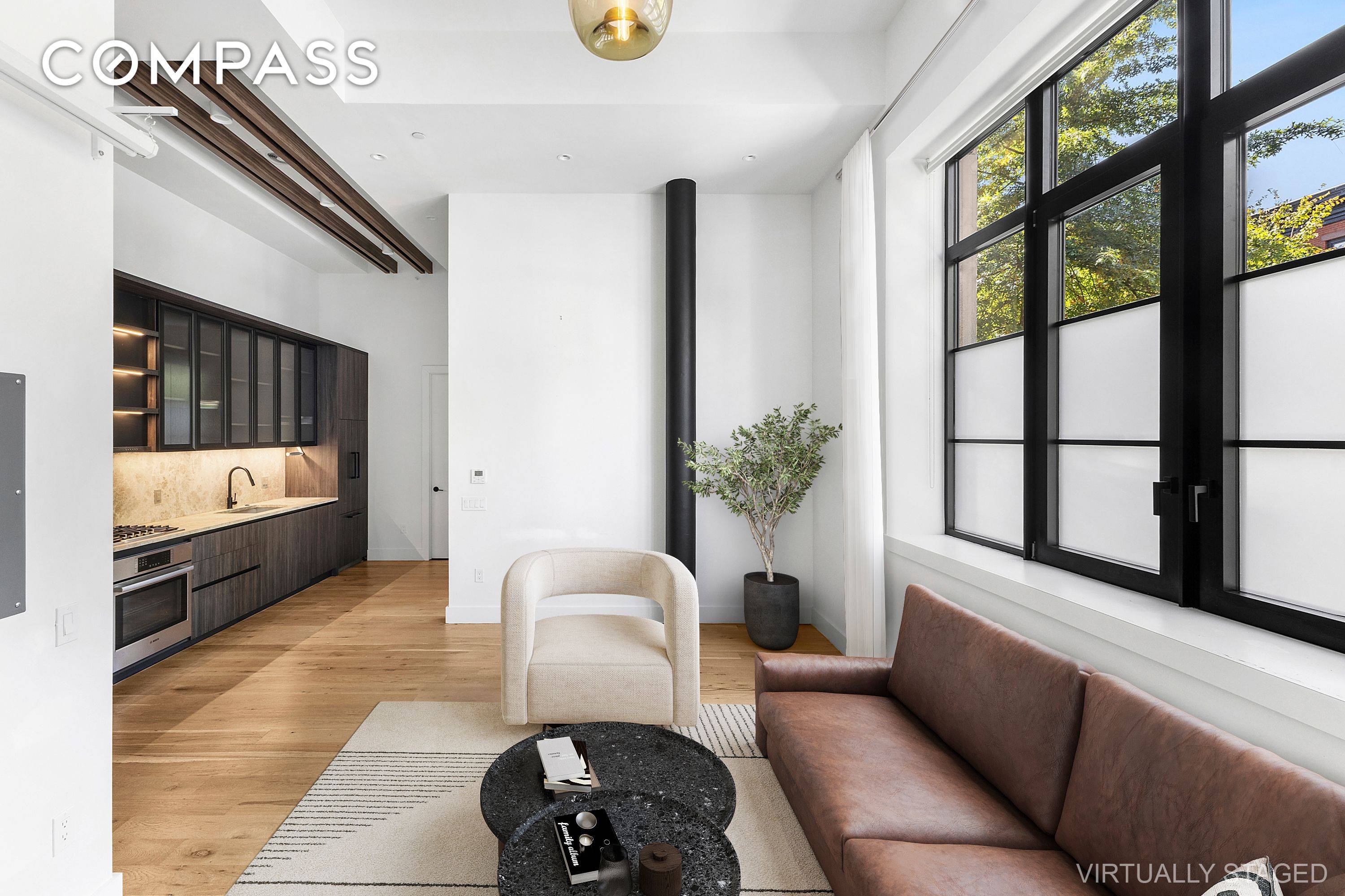 This 14 foot ceiling loft is now offered at 935, 000.