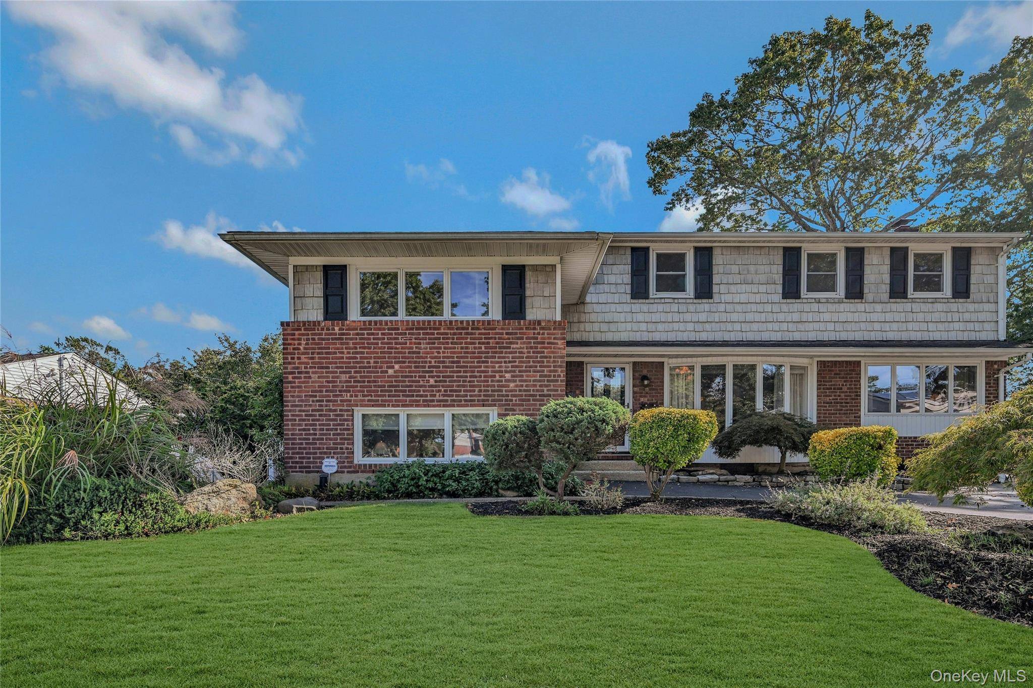 Fantastic 5 to 6 bedroom, 3 full bath split level home featuring oak floors and plenty of natural light.