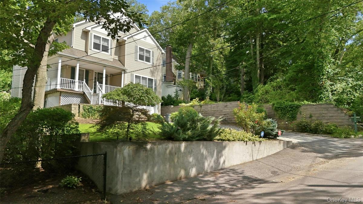 2 more parking spots in front of house