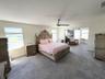 Master Bedroom on 2nd Floor (furnished) revealing the expansion and retreat