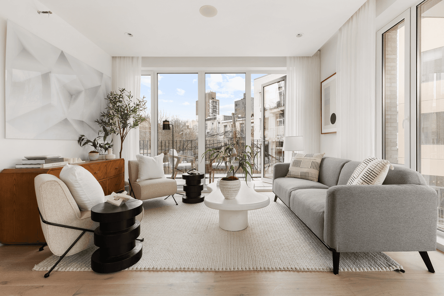 Welcome to this exquisite full floor condo with 3 bedrooms, 2 bathrooms, and a private terrace at The Woodpoint in Williamsburg.