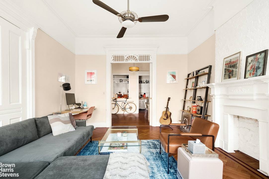 Wonderfully oversized parlor floor apartment replete with original details in a handsome 21ft wide brownstone on a picturesque tree lined block of Berkeley Place in prime Park Slope.
