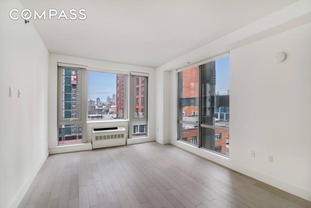 Unit 8A at The Vista in Long Island City is a spacious and luminous 2 bedroom 2 bath apartment complete with a private balcony.