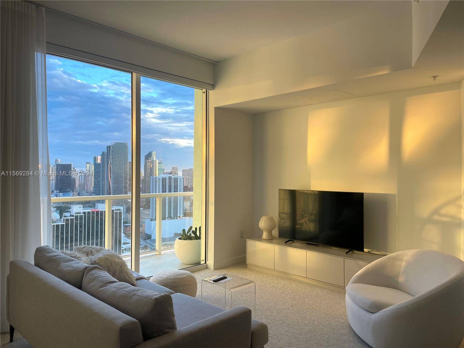 Beautiful light filled high floor condo with amazing downtown views.