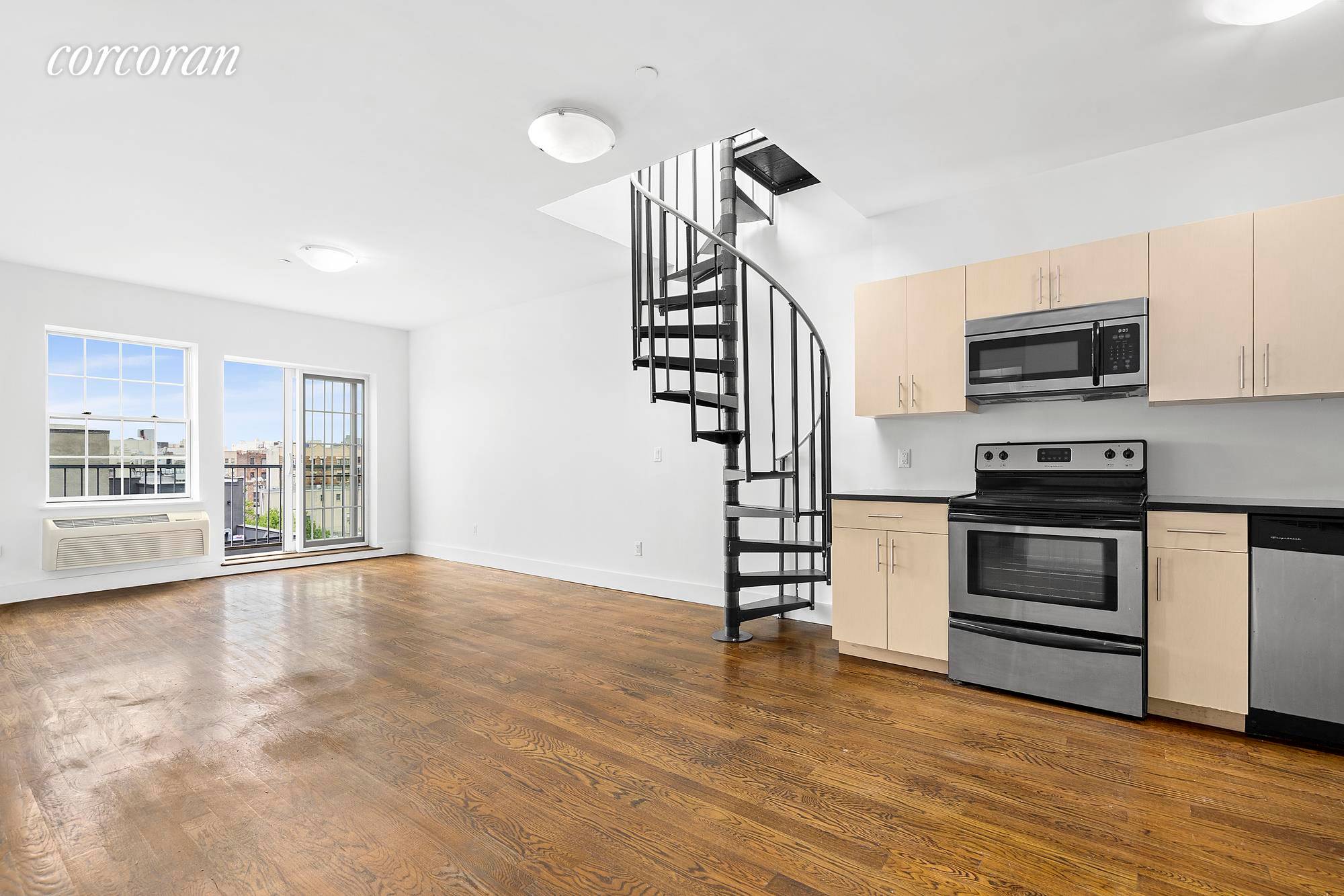 Modern 1 bedroom, rear facing apartment in the heart of South Williamsburg with private balcony and exclusive roof access !