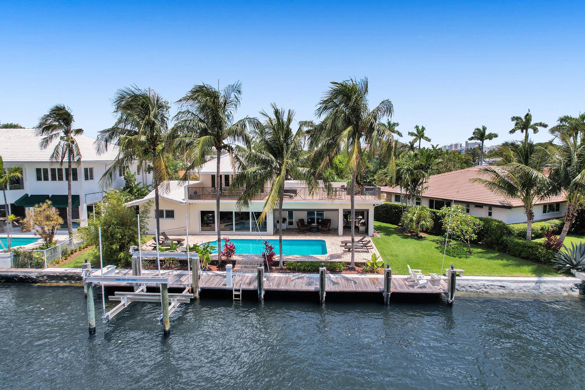 Beautifully reimagined 4 bedroom, waterfront home in the sought after Cove neighborhood.