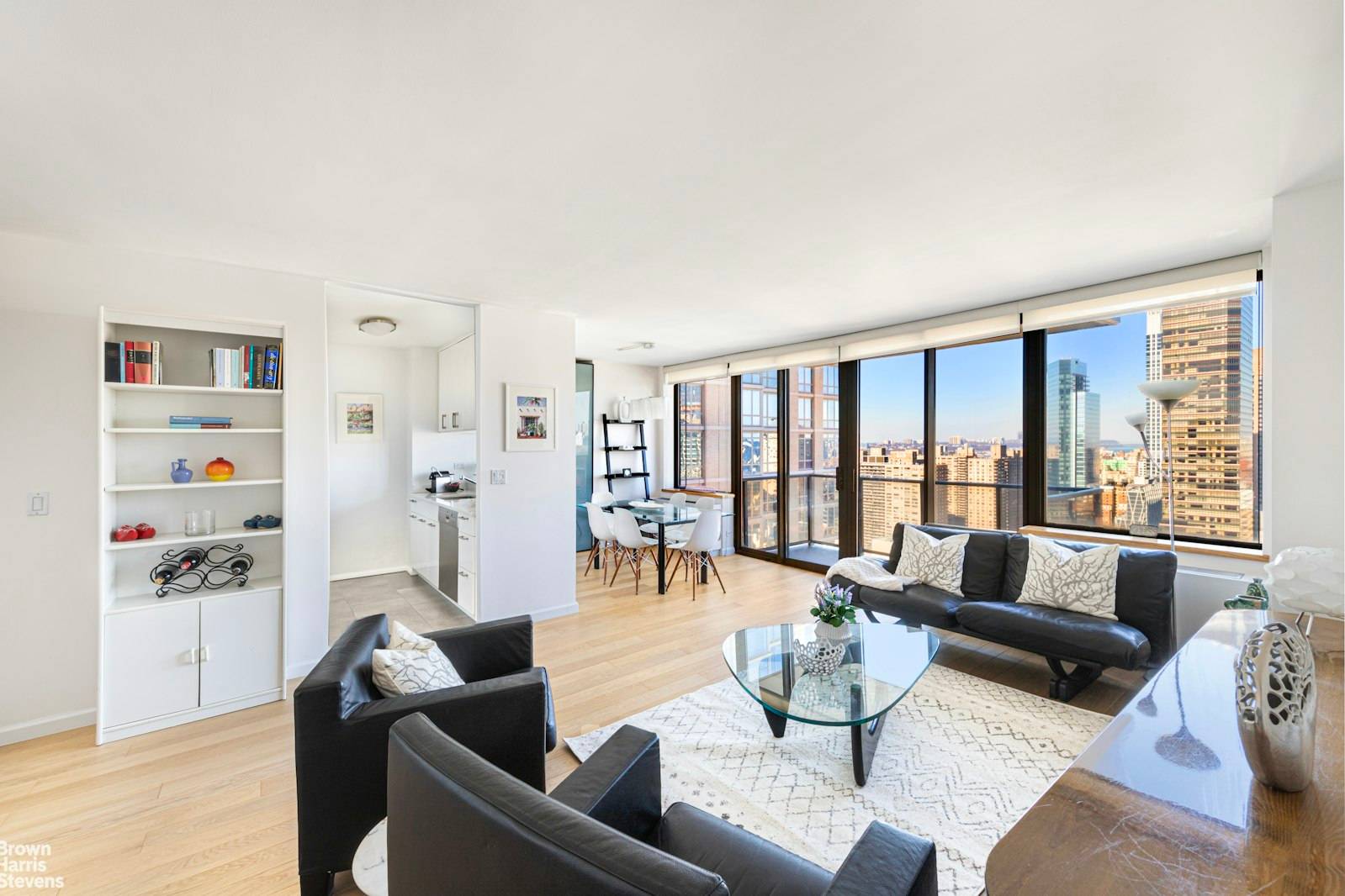Rarely available nicely renovated Junior 4 with balcony on the 32nd floor of The Alfred, a prime condo in Lincoln Square.