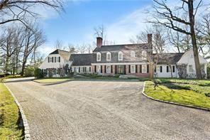 Oversized 1. 9 acre waterfront home in Indian Harbor Association with over 290 feet of Long Island Sound frontage.