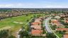 Ariel view of home with golf course views