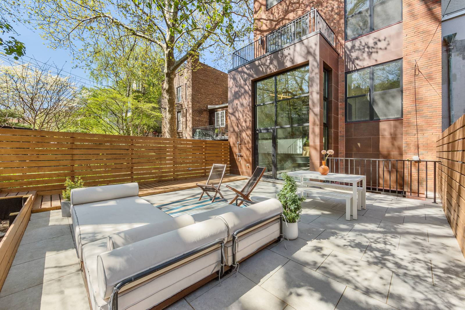The 38 Butler Street condominium is a limited collection of three newly renovated homes in a four story townhouse located on a tree lined block in beautiful Cobble Hill.